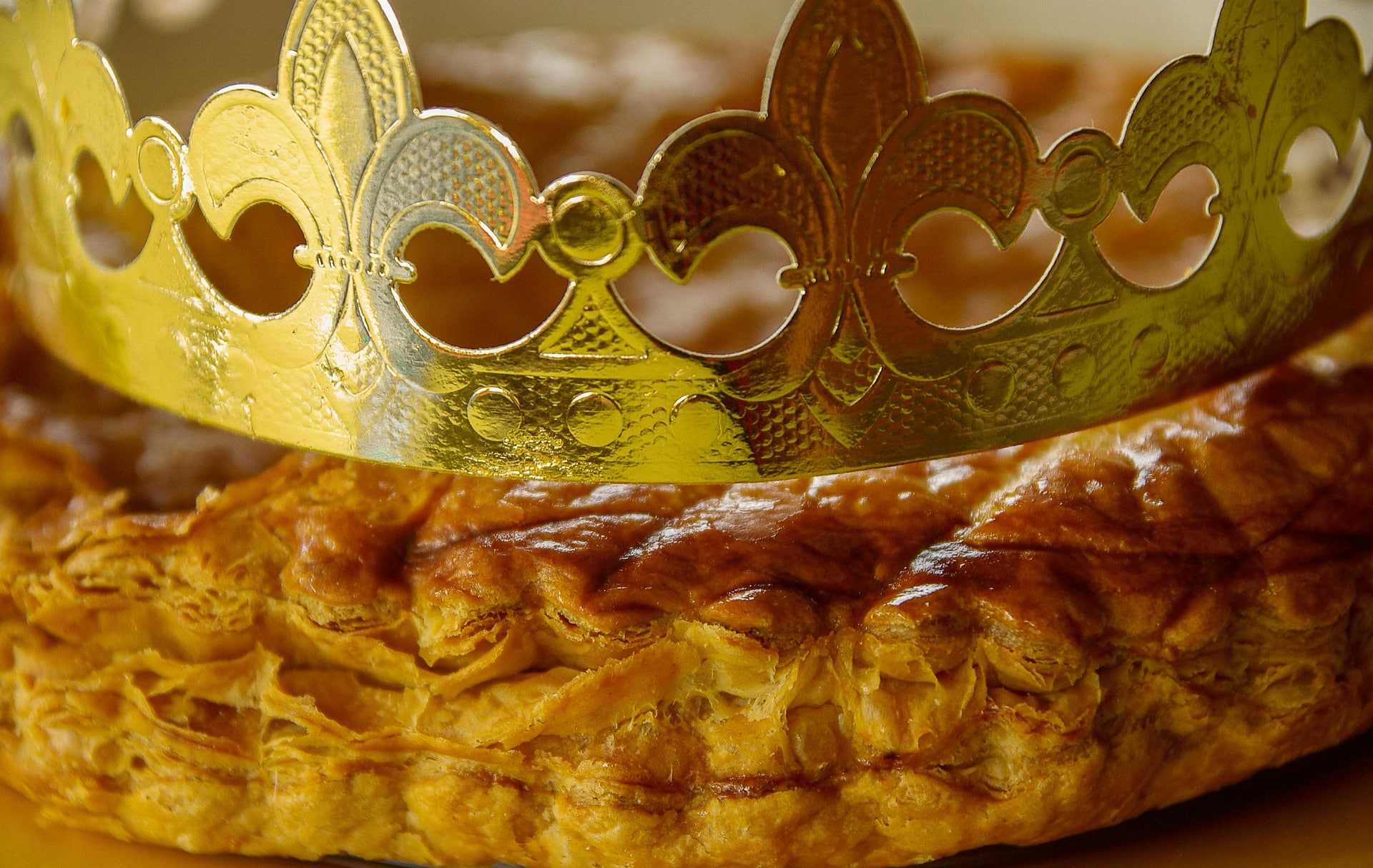 a beautiful galette des rois with a crown on top of it
